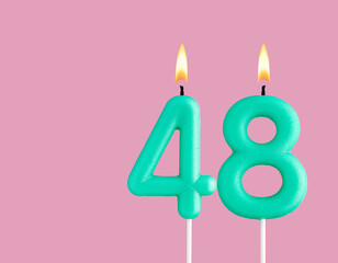 Birthday card with green number 48 candle - Pastel pink background