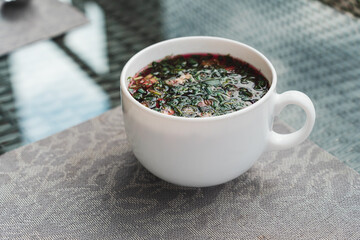 Cold beetroot soup, kholodnik, cold borscht, summer soup made of beets, herbs and eggs, popular in Ukraine, Belarus and Poland