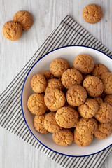 Homemade Sweet and Crunchy Amaretti on a Plate, top view. Flat lay, overhead, from above.
