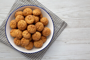 Homemade Sweet and Crunchy Amaretti on a Plate, top view. Flat lay, overhead, from above. Copy space.