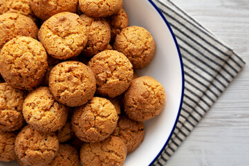 Homemade Sweet and Crunchy Amaretti on a Plate, top view. Flat lay, overhead, from above. Close-up.