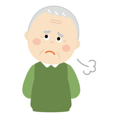 ため息をついている高齢の男性