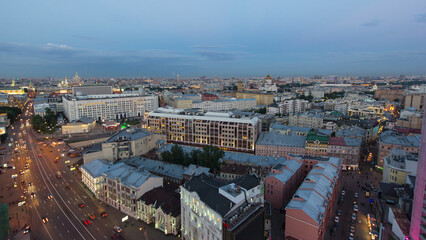 Fototapeta premium Panoramic view of the building from the roof of center Moscow day to night timelapse, Russia