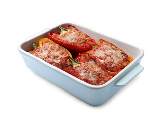 Tasty stuffed peppers in dish isolated on white