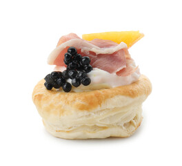 Delicious puff pastry with cream cheese, ham, black caviar and peach isolated on white