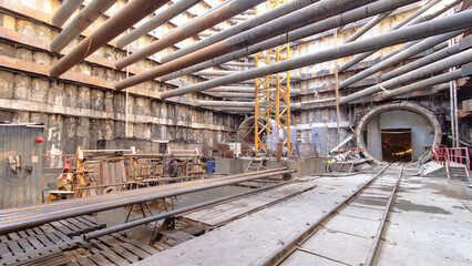 A large huge ditch pit tunnel timelapse at the construction site of the underground metro station...