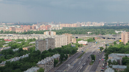 Fototapeta premium Traffic on the elevated avenue road aerial timelapse overpass on highway in a big city