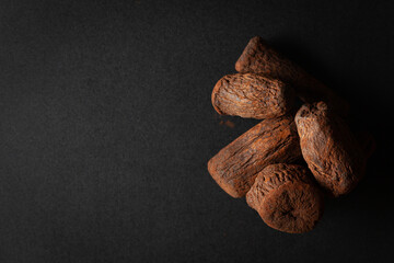 Close-up of Dry Organic Chicory (Cichorium intybus) roots, full-frame wallpaper, Top view.