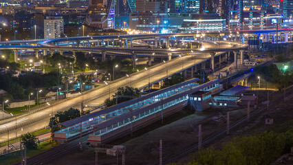 Obraz premium Small Ring of the Moscow Railways night timelapse in Moscow, Russia. Shelepikha Station