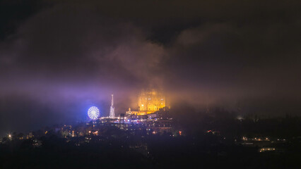 Temple of the Sacred Heart of Jesus timelapse on Tibidabo Mountain in Barcelona in clouds, Catalonia, Spain