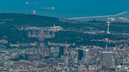 Top view from tibidabo of National Art Museum timelapse at Placa Espanya in Barcelona day to night, Catalonia, Spain