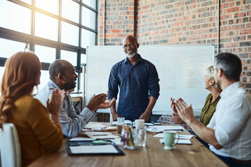 Portrait, businessman and applause in office for presentation, achievement and good news. Boardroom, mature ceo and public relations team for celebration, success and clapping hands for speaker
