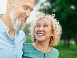 woman portrait mature couple happy together active bonding park outdoor middle aged man talking leisure park fun smiling love old middle mid aged nature wife walking
