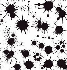 a bunch of black ink splots on a white background