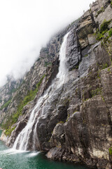Norway Prekestulen rock on a cloudy summer day