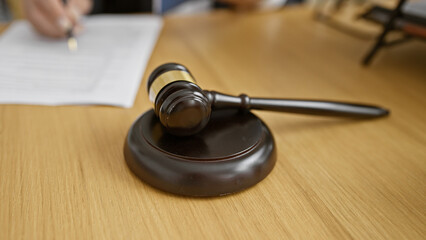 Elegant senior man lawyer taking careful notes at office, conveying legal justice