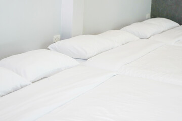 white pillow on bedroom