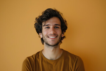 Fototapeta premium A close up portrait of a young man with a subtle smile