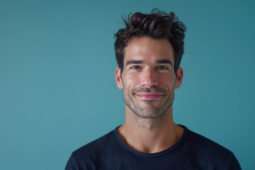 Fototapeta premium A close up portrait of a young man with a subtle smile