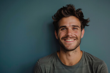 Fototapeta premium A close up portrait of a young man with a subtle smile