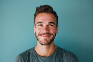 Obraz premium A close up portrait of a young man with a subtle smile