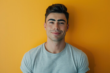 Fototapeta premium A close up portrait of a young man with a subtle smile