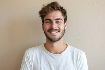 Fototapeta premium A close up portrait of a young man with a subtle smile