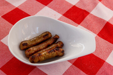 Grilled bavarian sausages on a table