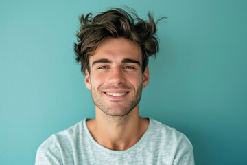 Fototapeta premium A close up portrait of a young man with a subtle smile