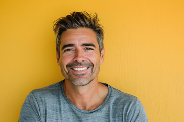 Obraz premium A close up portrait of a young man with a subtle smile