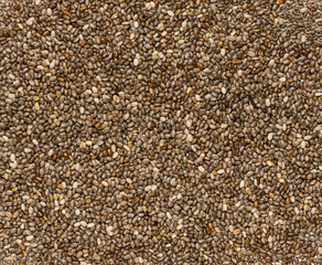 Chia seeds scattered in a heap, full frame