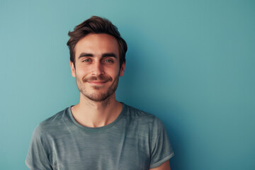 Obraz premium A close up portrait of a young man with a subtle smile