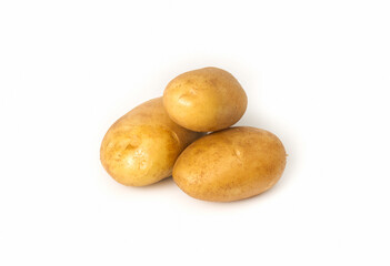 Three white potatoes on a white isolated background. Potato harvest