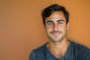 Fototapeta premium A close up portrait of a young man with a subtle smile
