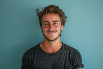 Obraz premium A close up portrait of a young man with a subtle smile
