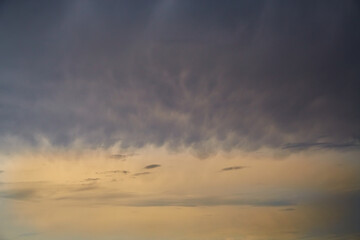Evening sky after rain in pastel tones, evening sky with pastel and purple tones