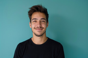 Obraz premium A close up portrait of a young man with a subtle smile