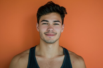Fototapeta premium A close up portrait of a young man with a subtle smile