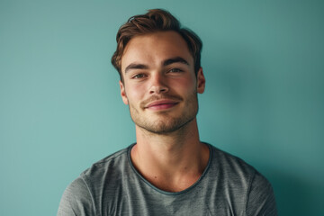 Obraz premium A close up portrait of a young man with a subtle smile