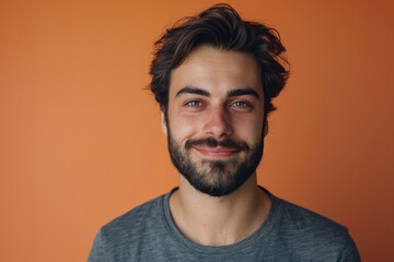 Obraz premium A close up portrait of a young man with a subtle smile
