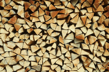 Wood stacked firewood logs. Natural fuel concept