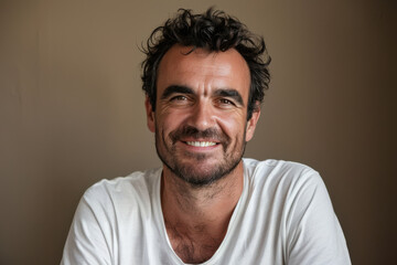 Fototapeta premium A close up portrait of a young man with a subtle smile