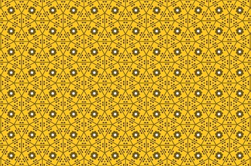 A yellow and black patterned background with a white flower in the center