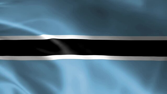 Botswana flag in the wind. Detailed fabric texture.