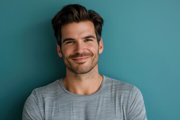 Obraz premium A close up portrait of a young man with a subtle smile