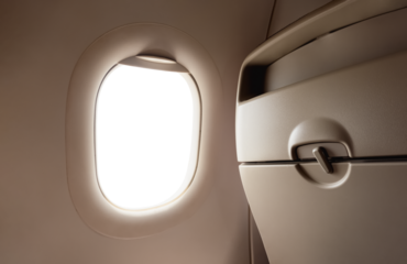Airplane window from inside Passenger plane POV looking out , Isolated Windows Plane in back seat