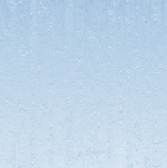 The background texture is blue with a natural wooden pattern