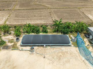 Covered small lagoon digester for biogas production from pig farm.