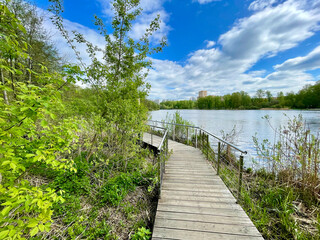 The embankment of the Pekhorka River in May. Moscow region, Balashikha city