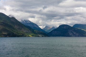 Norway Gerandefjord on a cloudy summer day.